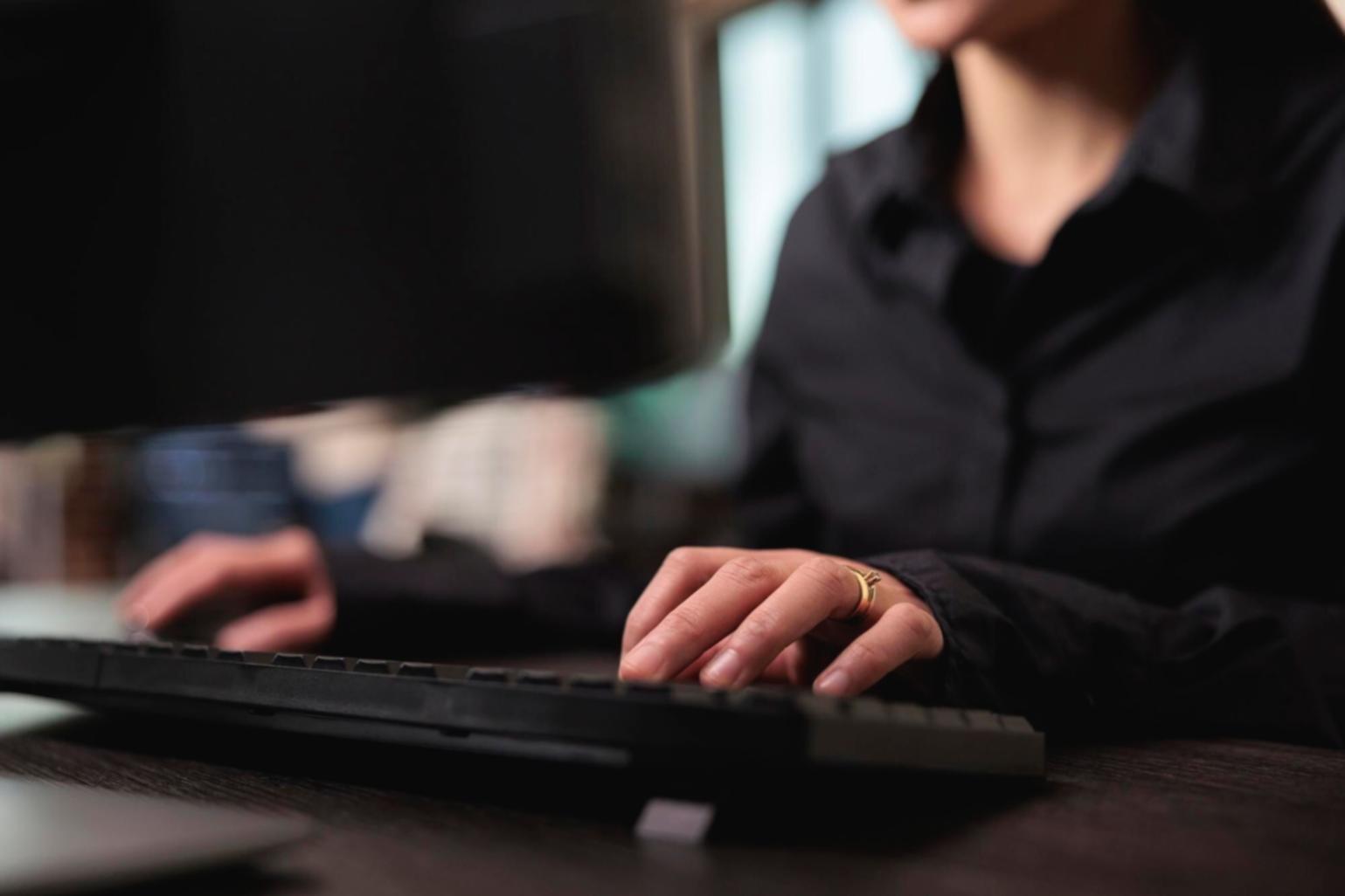 Students collaborating on frontend projects in modern classroom setting